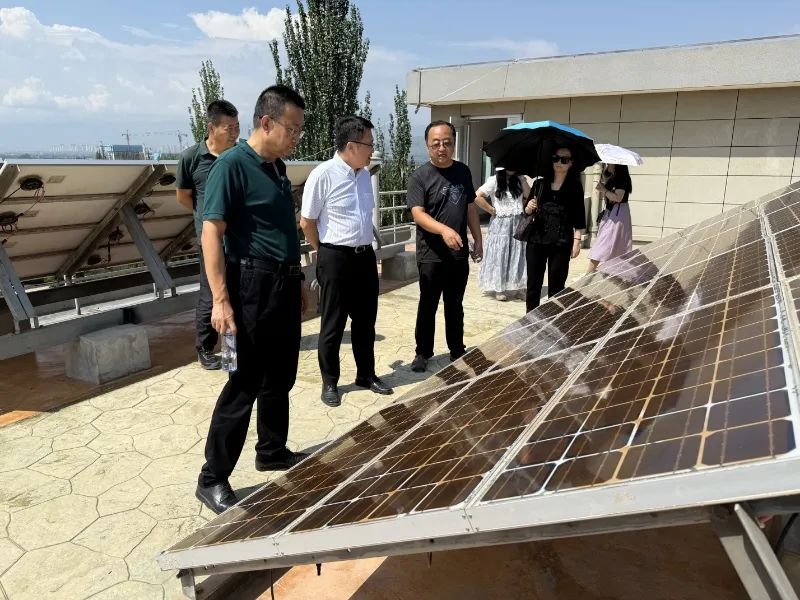商务部国际商务官员研修学院党委副书记、纪委书记郑乐一行到榆中基地考察调研